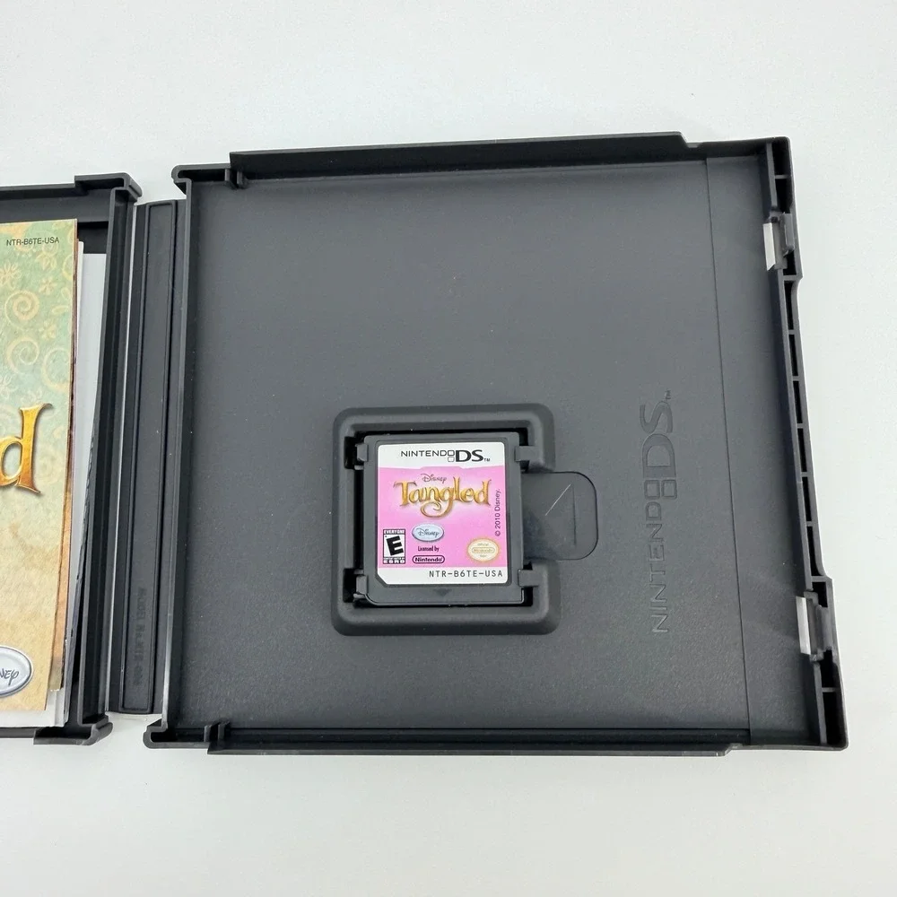 Bundle of 4 Nintendo DS Games Tangled Prince of Persia Animal Genius Minions
